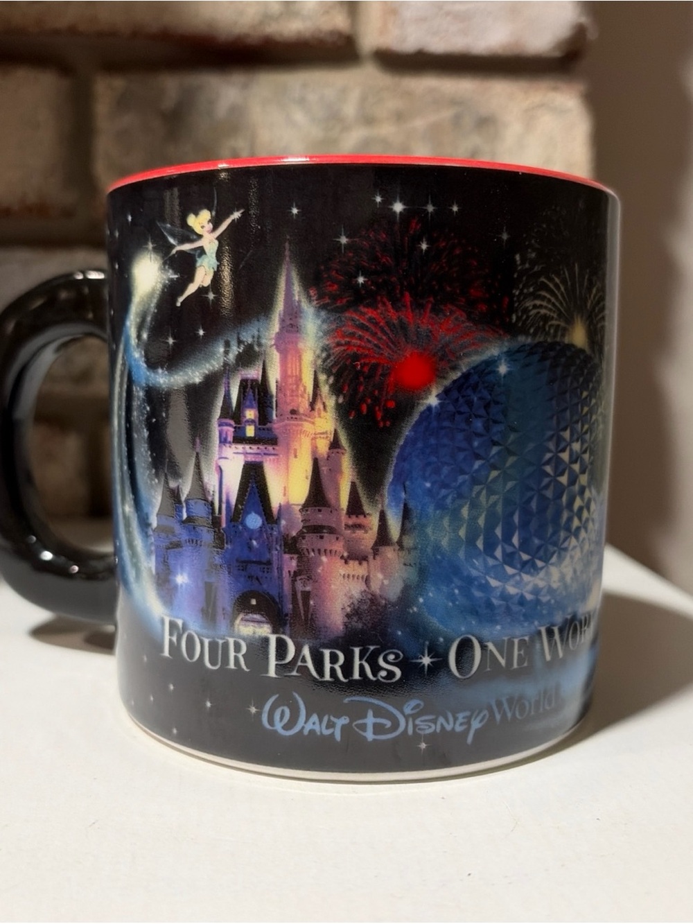 Disney Black Mug with Red Rim Featuring Castle, Spaceship Earth and Tinker Bell